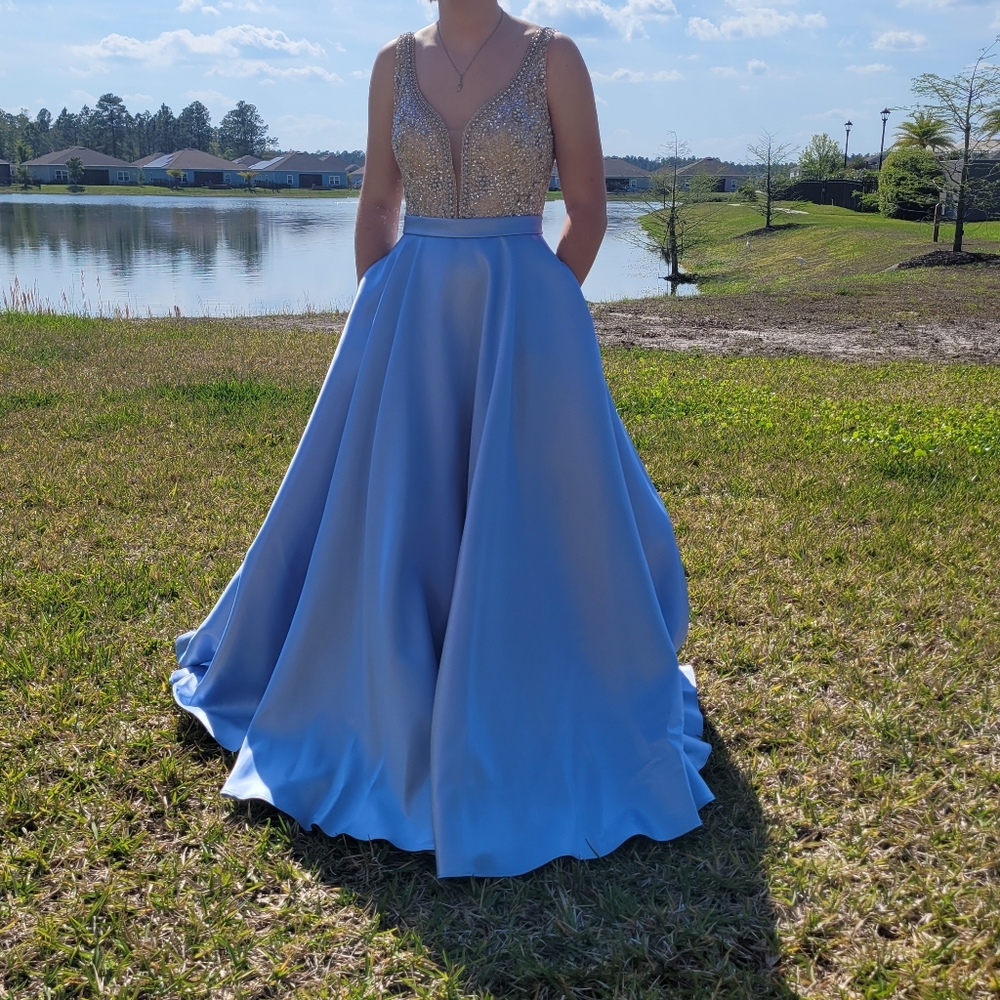 Gorgeous Cinderella blue gown with beaded halter top.